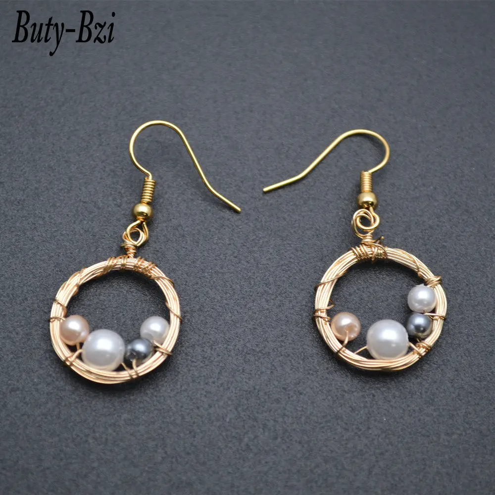 Natural Shell Copper Wire Wrapped Circle Shape Gold Color Dangle Earrings Chic Women Party Fashionable Jewelry Gift
Natural Shell Copper Wire Wrapped Circle Shape Gold Color Dangle Earrings Chic Women Party Fashionable Jewelry Gift