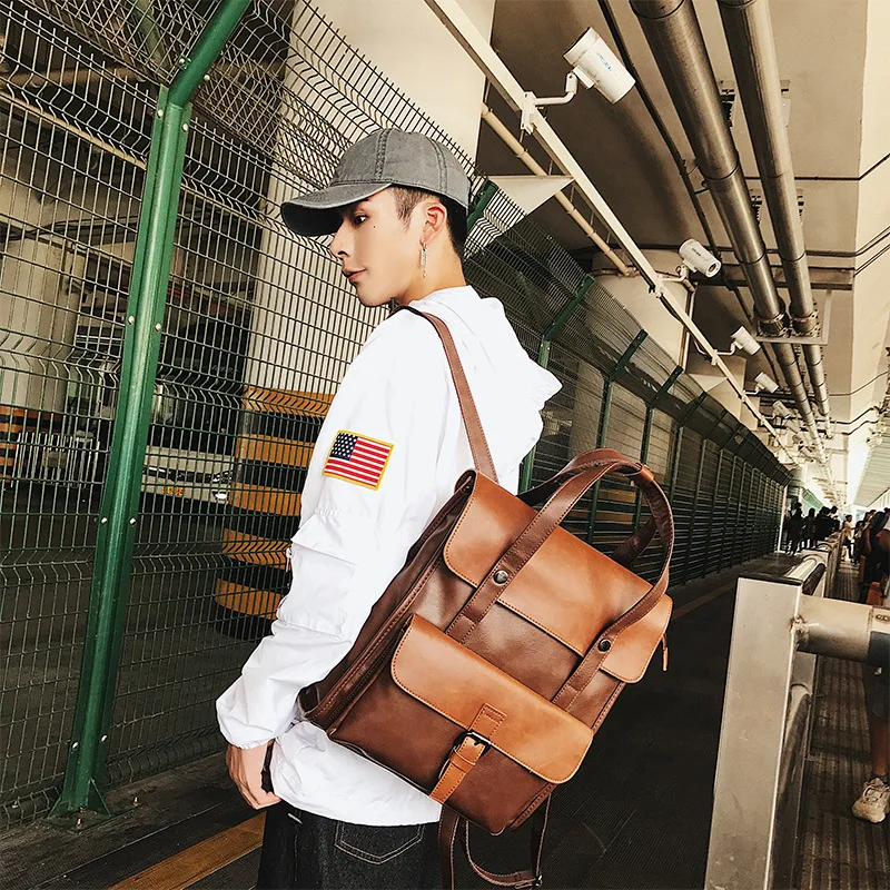 

New retro leather shoulder bag fashion backpack trend in Europe and the United States men's schoolbag portable