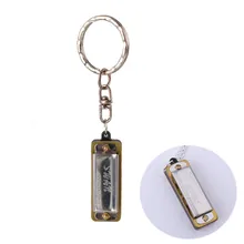 35x13x11mm Swan Mini Harmonica Keychain 4 Holes 8 Tone Portable Small Mouth Organ Silver Mini Harmonica Musical Instrument
35x13x11mm Swan Mini Harmonica Keychain 4 Holes 8 Tone Portable Small Mouth Organ Silver Mini Harmonica Musical Instrument
