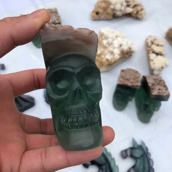 A natural specimen of a cluster of emerald - shaped skulls
A natural specimen of a cluster of emerald - shaped skulls