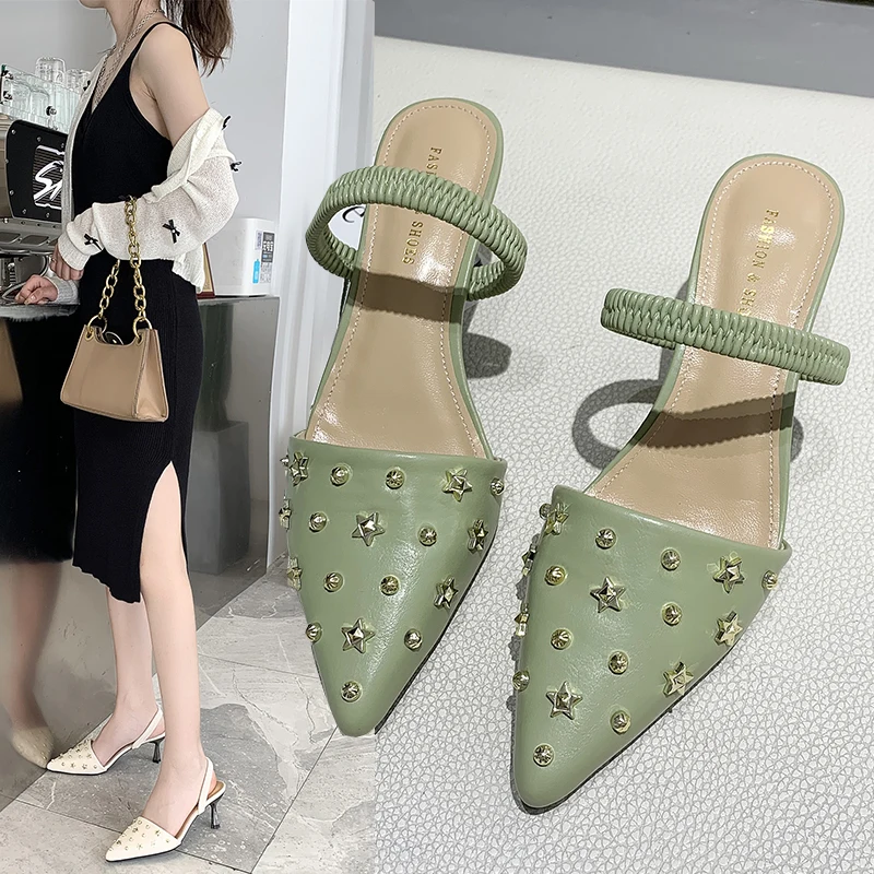 2020 summer rivets wild fashion pointed sandals female thin heels two high heel female sandals Z688 
2020 summer rivets wild fashion pointed sandals female thin heels two high heel female sandals Z688
