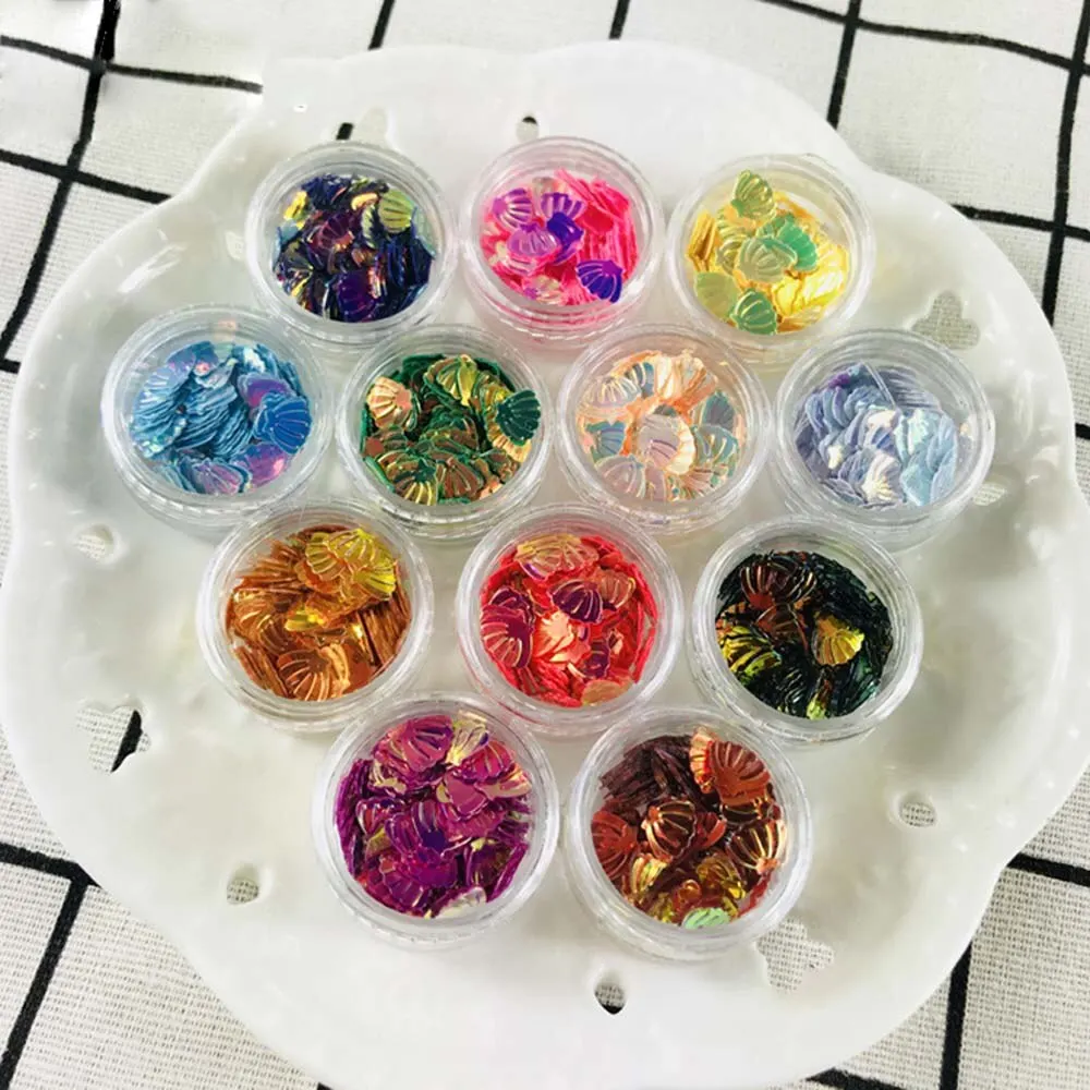 AB Color Shell Shape PVC Nail Sequin Crystal Drop Glue Filling about 3 cm-1 Group of 5
AB Color Shell Shape PVC Nail Sequin Crystal Drop Glue Filling about 3 cm-1 Group of 5
