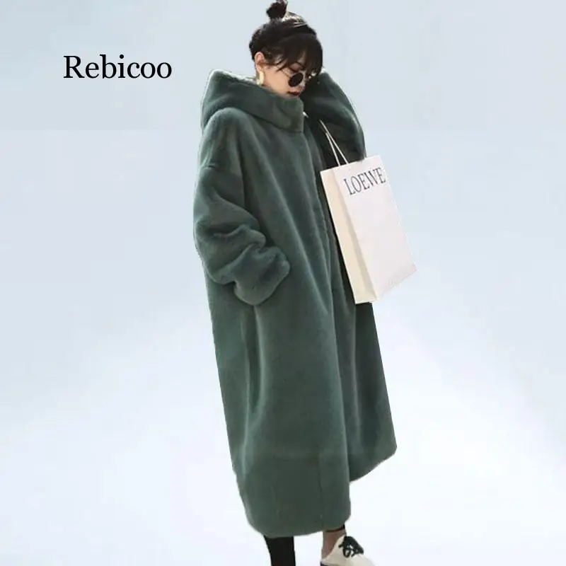 Oversize Hooded Faux Fur Coat Winter jacket Women Fashion Long Parka Thick Warm winter coat women Female Loose Faux Fur jackets
Oversize Hooded Faux Fur Coat Winter jacket Women Fashion Long Parka Thick Warm winter coat women Female Loose Faux Fur jackets