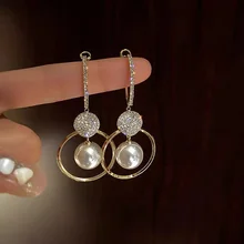Korean New Fashion Oversized White Pearl Drop Earrings for Women Bohemian Golden Round Zirconia Wedding Earrings Jewelry Gift
Korean New Fashion Oversized White Pearl Drop Earrings for Women Bohemian Golden Round Zirconia Wedding Earrings Jewelry Gift
