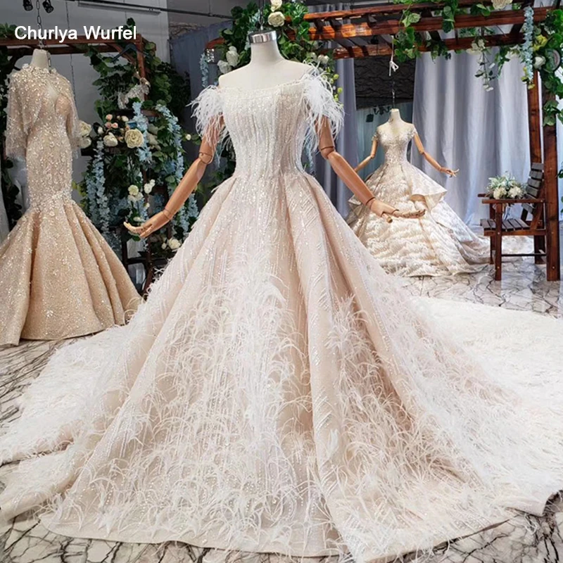 HTL781 newest wedding dresses with feather off shoulder boat neck bead wedding gown online shop china high-end vestido de noiva
HTL781 newest wedding dresses with feather off shoulder boat neck bead wedding gown online shop china high-end vestido de noiva
