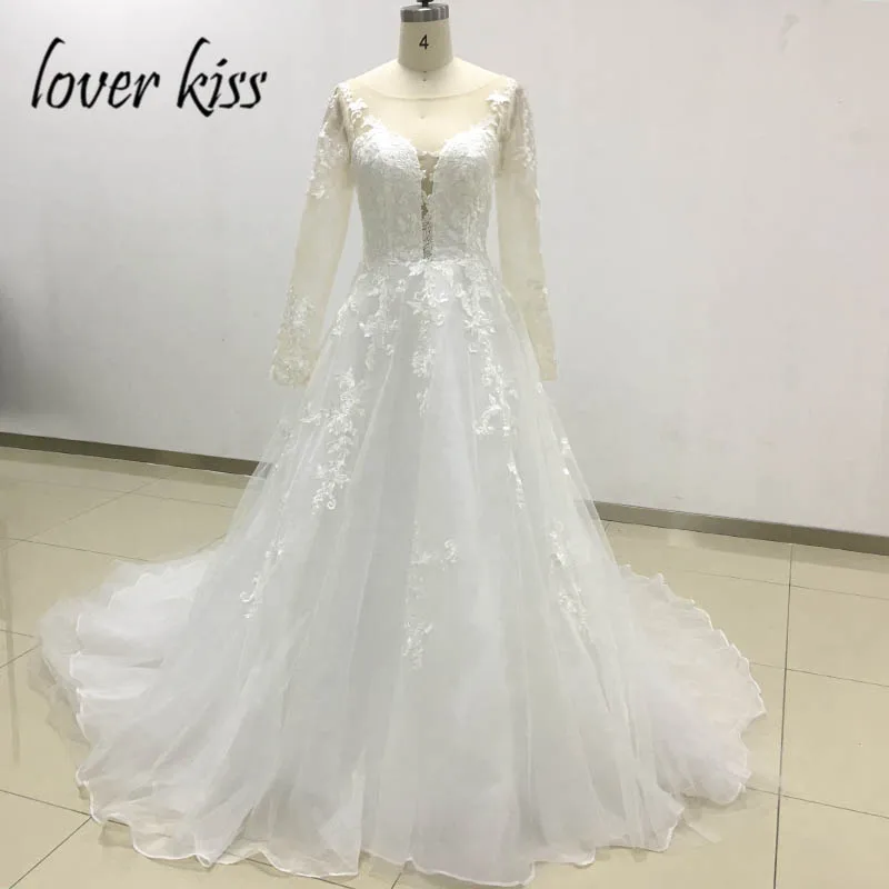 Lover Kiss Vestido De Noiva Real Photo Sheer Tulle Long Sleeve Wedding Dresses V neck Lace Customize Bridal Gowns Hochzeitsklei
Lover Kiss Vestido De Noiva Real Photo Sheer Tulle Long Sleeve Wedding Dresses V neck Lace Customize Bridal Gowns Hochzeitsklei