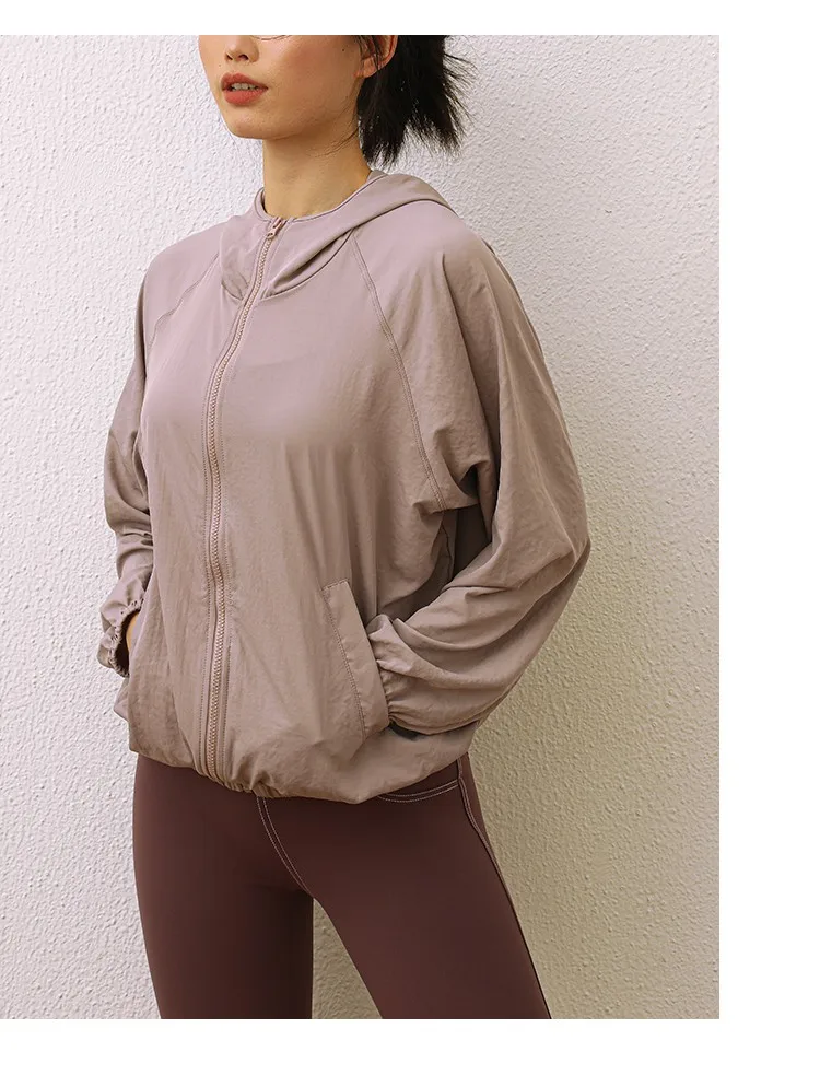 Automne hiver nouvelle veste de sport femmes fermeture éclair à manches longues à capuche en vrac Fitness gymnase décontracté course formation manteau Yoga vêtements Automne hiver nouvelle veste de sport femmes fermeture éclair à manches longues à capuche en vrac Fitness gymnase décontracté course formation manteau Yoga vêtements
