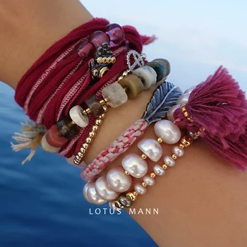 

Lotus Mann Two circles of braided pink freshwater pearl small tassel bracelet decorated with rope female ins niche design sense