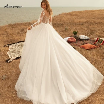 Brautkleid Sexy Bridal Long Sleeves Summer Wedding Dress Beach 2020 Robe Marie Tulle Wedding Gowns See Through Lace Appliques 
Brautkleid Sexy Bridal Long Sleeves Summer Wedding Dress Beach 2020 Robe Marie Tulle Wedding Gowns See Through Lace Appliques