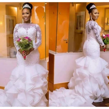 Newest South African Mermaid Wedding Dresses Plus size Long Sleeve Sheer Neck Bodycon Fishtail Bridal Gowns Beaded Layer Ruffles
Newest South African Mermaid Wedding Dresses Plus size Long Sleeve Sheer Neck Bodycon Fishtail Bridal Gowns Beaded Layer Ruffles