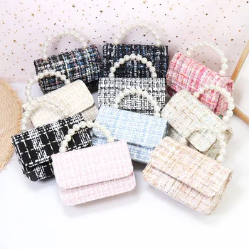 Children's bags 2020 spring and summer new girls messenger bag princess personalized pearl handbag cotton and linen shoulder bag
Children's bags 2020 spring and summer new girls messenger bag princess personalized pearl handbag cotton and linen shoulder bag