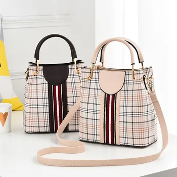 Handbag female summer 2020 new fashion commuter shoulder messenger bag simple and versatile bucket bag trendy casual female bag
Handbag female summer 2020 new fashion commuter shoulder messenger bag simple and versatile bucket bag trendy casual female bag