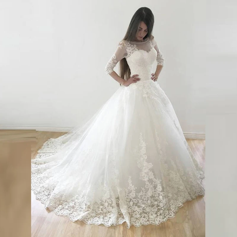 New Charming Princess Lace Ball Gown Bridal Wedding Dresses with 3/4 Sleeves Illusion Boat Neck Wedding Gowns for Bride Applique
New Charming Princess Lace Ball Gown Bridal Wedding Dresses with 3/4 Sleeves Illusion Boat Neck Wedding Gowns for Bride Applique