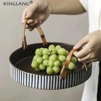 Kinglang Jingdezhen Ceramic Plate with Cow Leather Handmade Handle Stripe Round Sallow Fruit Plate Table Display Tray
Kinglang Jingdezhen Ceramic Plate with Cow Leather Handmade Handle Stripe Round Sallow Fruit Plate Table Display Tray