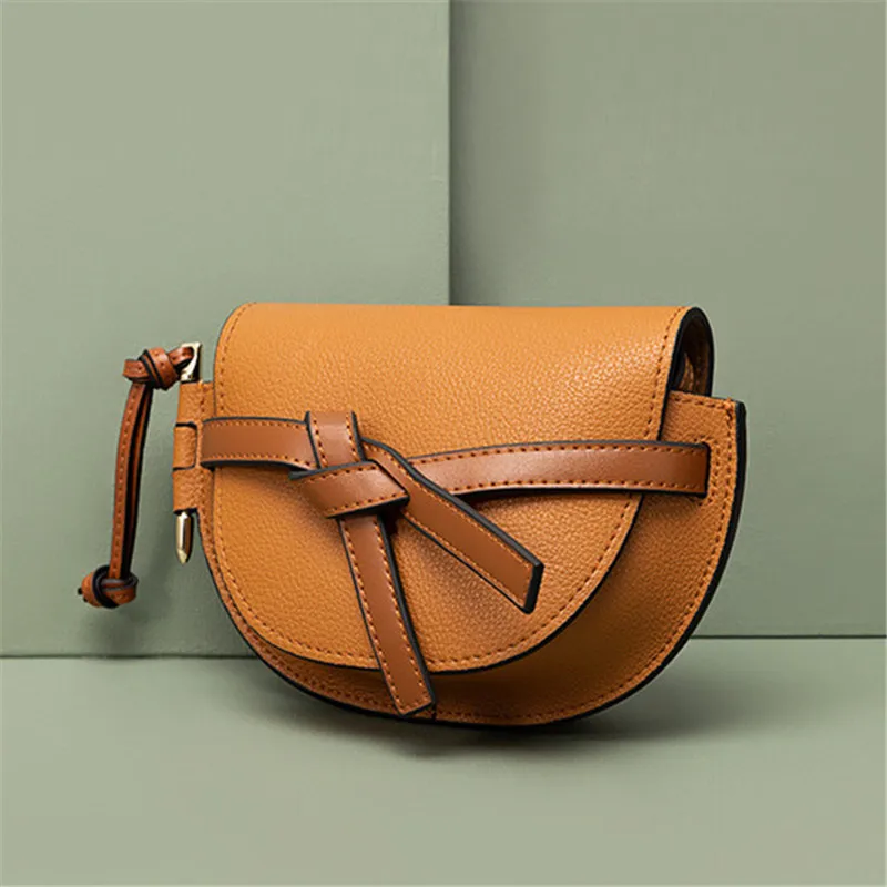 2019 New Famous Designer Mini Mobile Phone Bag High Quality Women Leather Shoulder Messenger Bow Saddle Bag Purse and Handbags
2019 New Famous Designer Mini Mobile Phone Bag High Quality Women Leather Shoulder Messenger Bow Saddle Bag Purse and Handbags