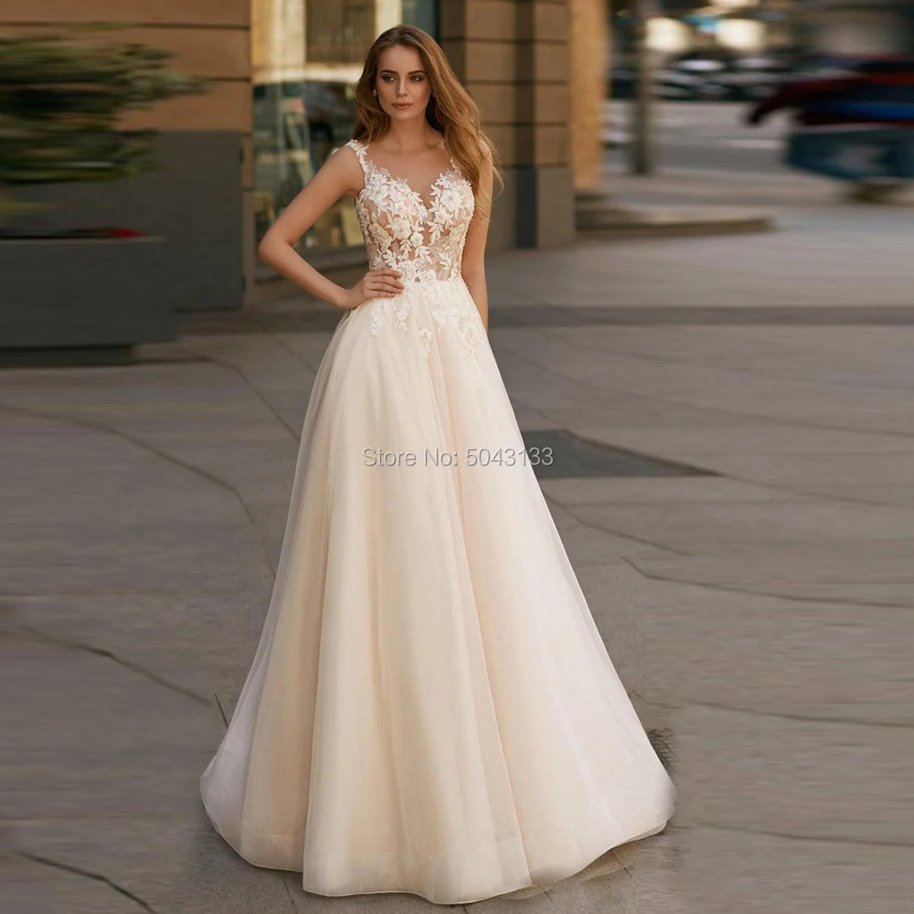 A Line Boho Soft Tulle Wedding Dresses V Neck Applique Flowers Sleeveless Floor Length Bridal Gowns Champagne Bride Dress 2019
A Line Boho Soft Tulle Wedding Dresses V Neck Applique Flowers Sleeveless Floor Length Bridal Gowns Champagne Bride Dress 2019