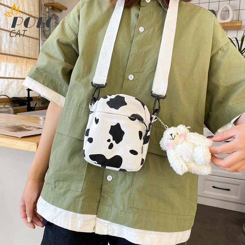 Women's Fashion Canvas Simple Solid Leisure Shoulder Messenger Bags Mini Travel Casual Wild Crossbody Bags Spot Black and White 
Women's Fashion Canvas Simple Solid Leisure Shoulder Messenger Bags Mini Travel Casual Wild Crossbody Bags Spot Black and White