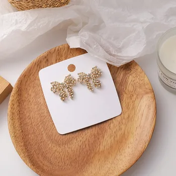 2020 New Sweet Pearl Bowknot Senior Drop Earrings Elegant Contracted Temperament Fashion Crystal Women Earrings
2020 New Sweet Pearl Bowknot Senior Drop Earrings Elegant Contracted Temperament Fashion Crystal Women Earrings