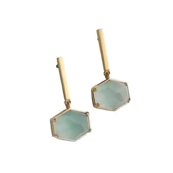 Devota & Lomba yellow gold earrings with chalcedony.
Devota & Lomba yellow gold earrings with chalcedony.