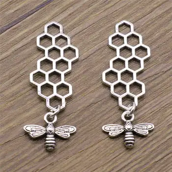 15 Pieces Silver Color Honeycomb Bee 45x15mm Pendant Charms Wholesale Bulk Sale Diy Pendants For Crafts 
15 Pieces Silver Color Honeycomb Bee 45x15mm Pendant Charms Wholesale Bulk Sale Diy Pendants For Crafts