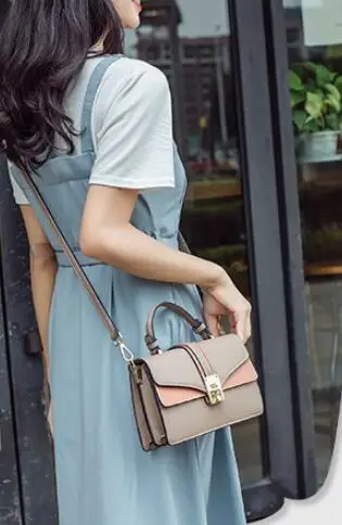 New temperament single shoulder slung versatile bag Korean version of the color matching package
New temperament single shoulder slung versatile bag Korean version of the color matching package