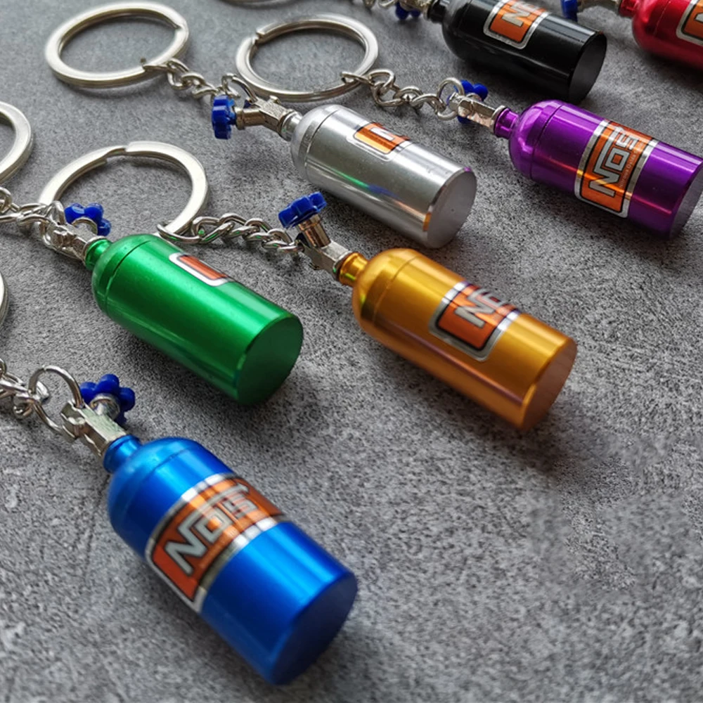 Key Chain Key Ring Holder NOS Turbo Shape Nitrogen Bottle Metal Car Keychain Pendant Jewelry for Women Men Unique mini keyring
Key Chain Key Ring Holder NOS Turbo Shape Nitrogen Bottle Metal Car Keychain Pendant Jewelry for Women Men Unique mini keyring