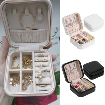 Simple, elegant and portable pu leather travel jewelry storage box makeup organizer box
Simple, elegant and portable pu leather travel jewelry storage box makeup organizer box