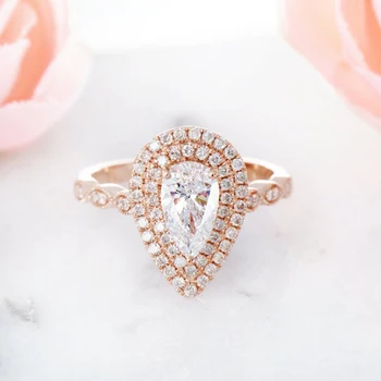 CxsJeremy Solid14K Rose Gold Center 4*6mm 0.5ct Pear Cut DEF Color Unque Moissanite Halo Engagement Ring for Women Wedding Gift 
CxsJeremy Solid14K Rose Gold Center 4*6mm 0.5ct Pear Cut DEF Color Unque Moissanite Halo Engagement Ring for Women Wedding Gift