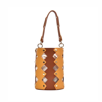 Hollow bucket bag women geometric rivets shoulder bag 2020 New Hollow Out Beach Bag Bolsa Feminina tote bags PU crossbody Bag 
Hollow bucket bag women geometric rivets shoulder bag 2020 New Hollow Out Beach Bag Bolsa Feminina tote bags PU crossbody Bag