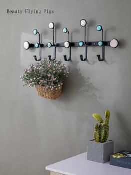 Creative home hangers into the door behind the wall hanging wall porch coat bag key racks wall wrought iron clothes hook
Creative home hangers into the door behind the wall hanging wall porch coat bag key racks wall wrought iron clothes hook