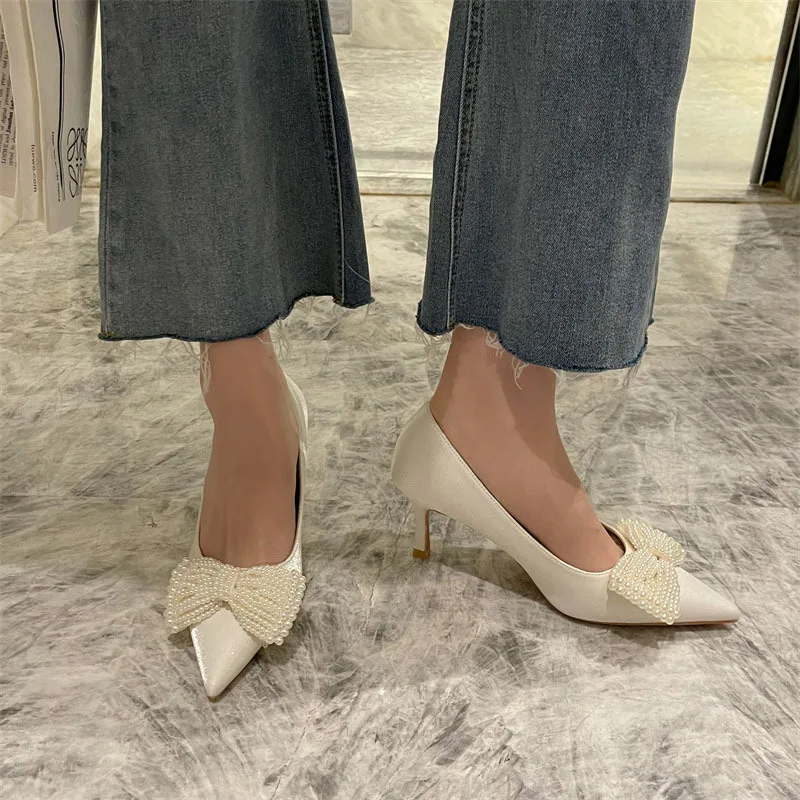 

2022 Spring and Autumn New High-heeled Shoes Pearl Bow White Wedding Shoes Thin Heel Pointed Bridesmaid Shoes Are Versatile