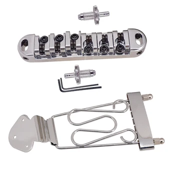 6 String Guitar Trapeze Tailpiece Bridge with Roller Saddle Bridge, Lock Posts and Wrench for Jazz Archtop Guitar
6 String Guitar Trapeze Tailpiece Bridge with Roller Saddle Bridge, Lock Posts and Wrench for Jazz Archtop Guitar