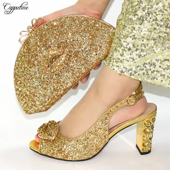 New coming gold high heel sandal shoes and evening bag set with stones for party VC109 heel height 9cm 
New coming gold high heel sandal shoes and evening bag set with stones for party VC109 heel height 9cm