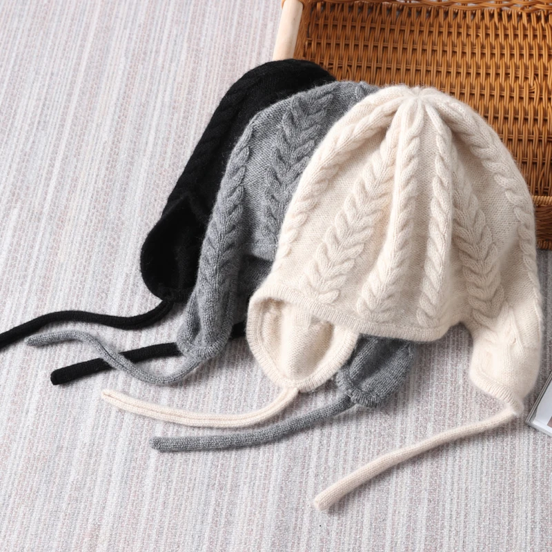 Women Autumn Winter Cashmere Wool Knit Bomber Hat Cable Thick Warm Soft Earmuff Russian Caps Warm Light Real Pashmina Guaranteed
Women Autumn Winter Cashmere Wool Knit Bomber Hat Cable Thick Warm Soft Earmuff Russian Caps Warm Light Real Pashmina Guaranteed