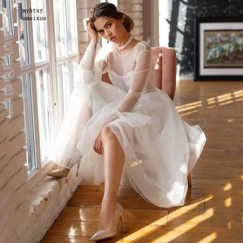 Sexy Full Tulle O-neck Tea-length Button A-line Regular Illusion Boho Plus Size Wedding Dress Long Sleeve Vestidos De Novia 2020
Sexy Full Tulle O-neck Tea-length Button A-line Regular Illusion Boho Plus Size Wedding Dress Long Sleeve Vestidos De Novia 2020
