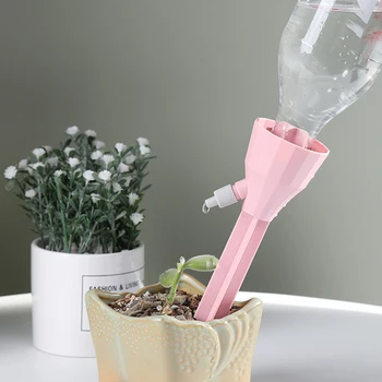 Self Watering 18pcs Auto Drip Irrigation Watering System Automatic Watering Spike Plant Flowers Indoor Household Waterers Bottle 
Self Watering 18pcs Auto Drip Irrigation Watering System Automatic Watering Spike Plant Flowers Indoor Household Waterers Bottle