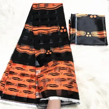 Gahna Style satin silk fabric with organza ribbon African wax design 4yards+2yards matching 
Gahna Style satin silk fabric with organza ribbon African wax design 4yards+2yards matching