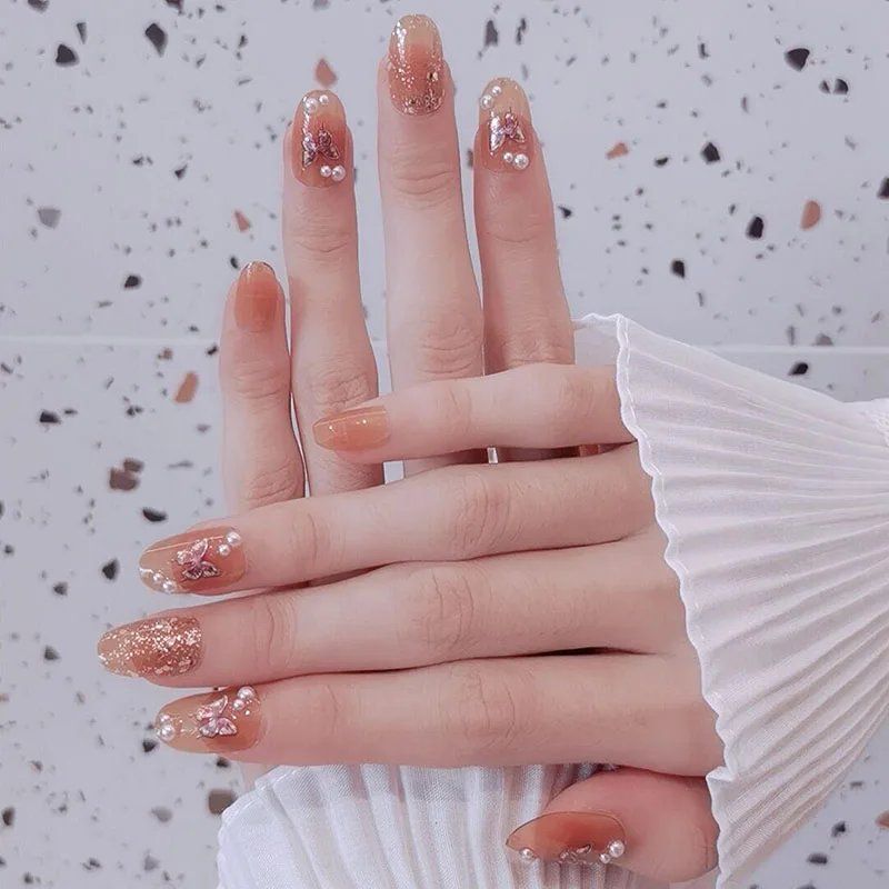 Glitter Butterfly False Nails with Glue Pure Color Semi-transparent Full Nail Tips with Pearl Decorations Ladies Fake Nails
Glitter Butterfly False Nails with Glue Pure Color Semi-transparent Full Nail Tips with Pearl Decorations Ladies Fake Nails