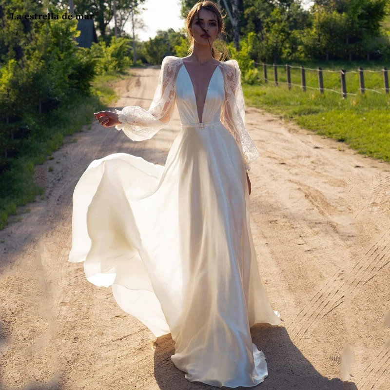Boho Country Wedding Dresses long deep V neck Lace Puf Long Sleeves A Line Backless ivory Bridal Gowns beautiful mariage robe
Boho Country Wedding Dresses long deep V neck Lace Puf Long Sleeves A Line Backless ivory Bridal Gowns beautiful mariage robe