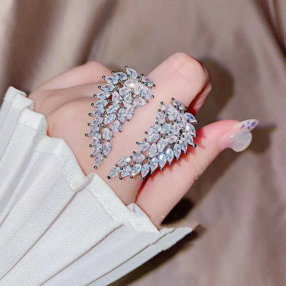 NPKDS Luxury and Elegant Full Diamond Zircon Open Engagement Women Ring Silver Super Flashing Hearts and Arrows Angel Wing Ring
NPKDS Luxury and Elegant Full Diamond Zircon Open Engagement Women Ring Silver Super Flashing Hearts and Arrows Angel Wing Ring