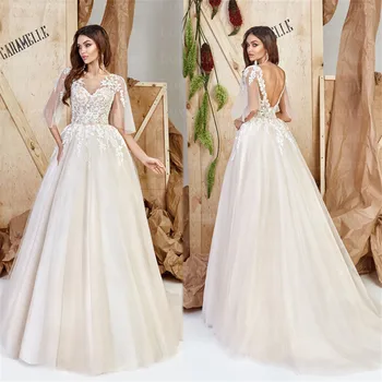 Champagne Boho Wedding Dresses 2021 Scoop A Line Lace Appliques Sparkling Bridal Gown Vestidos De Novia Bride Dresses Backless 
Champagne Boho Wedding Dresses 2021 Scoop A Line Lace Appliques Sparkling Bridal Gown Vestidos De Novia Bride Dresses Backless