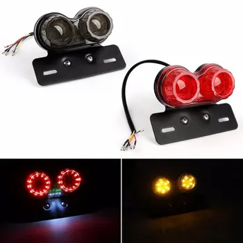 Universal Motorcycle LED Tail Light Motorbike Rear Lamp License Plate Light with Bracket Turn Signal brake light 
Universal Motorcycle LED Tail Light Motorbike Rear Lamp License Plate Light with Bracket Turn Signal brake light