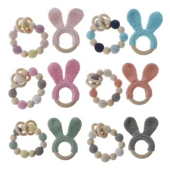 2Pcs Natural Wooden Crochet Baby Teether Teething Bracelet Ring Rattle Toy Gift 
2Pcs Natural Wooden Crochet Baby Teether Teething Bracelet Ring Rattle Toy Gift