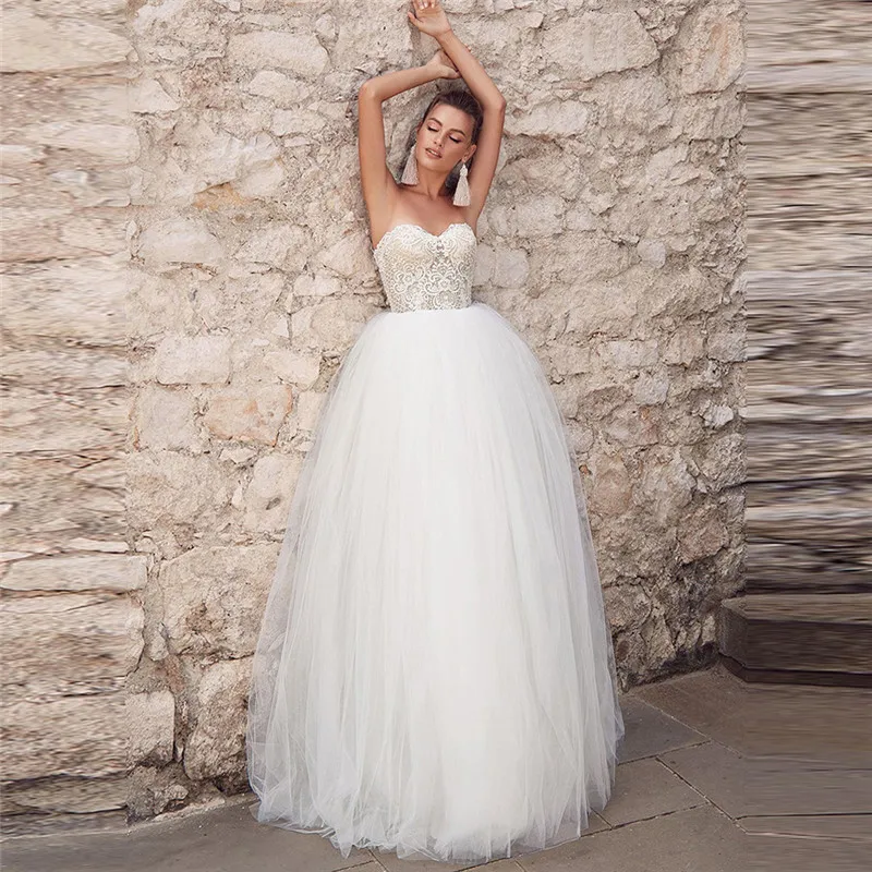 2021 Sexy Sweetheart Ball Gown Wedding Dress Lace Top Tulle Floor Length Princess New Design Bridal Gowns Garden
2021 Sexy Sweetheart Ball Gown Wedding Dress Lace Top Tulle Floor Length Princess New Design Bridal Gowns Garden