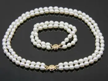 2 row Genuine Natural white oval freshwater 8-9mm pearl necklace bracelet 
2 row Genuine Natural white oval freshwater 8-9mm pearl necklace bracelet