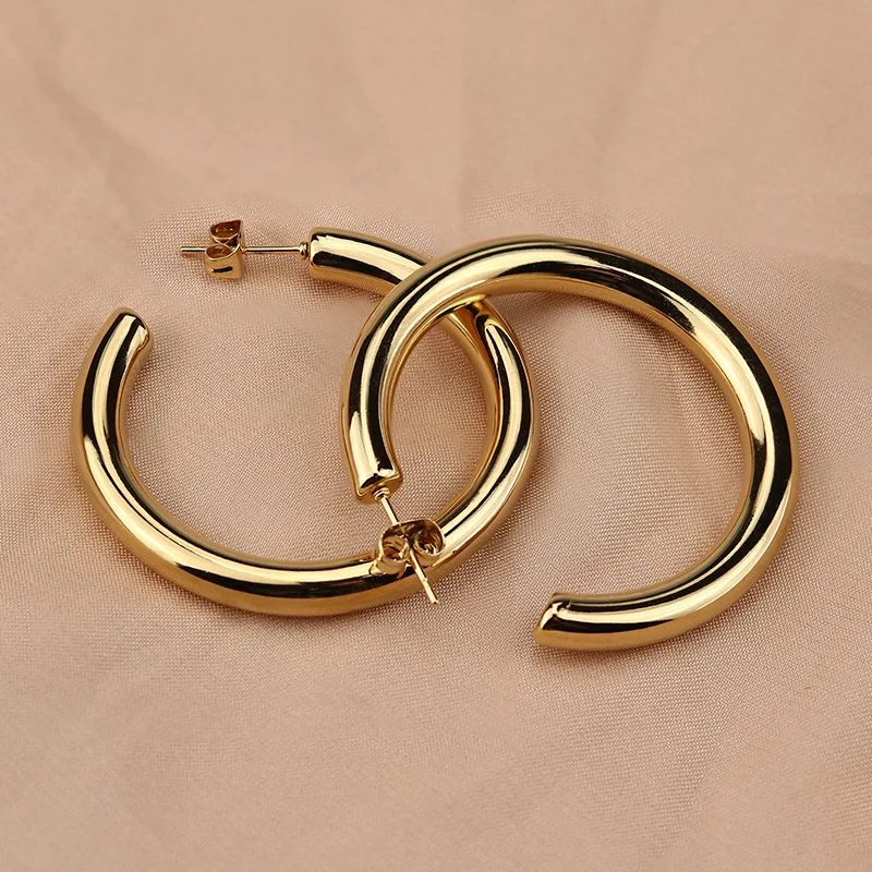 Фото Большие золотые серьги-кольца простые толстые круглые из нержавеющей стали для