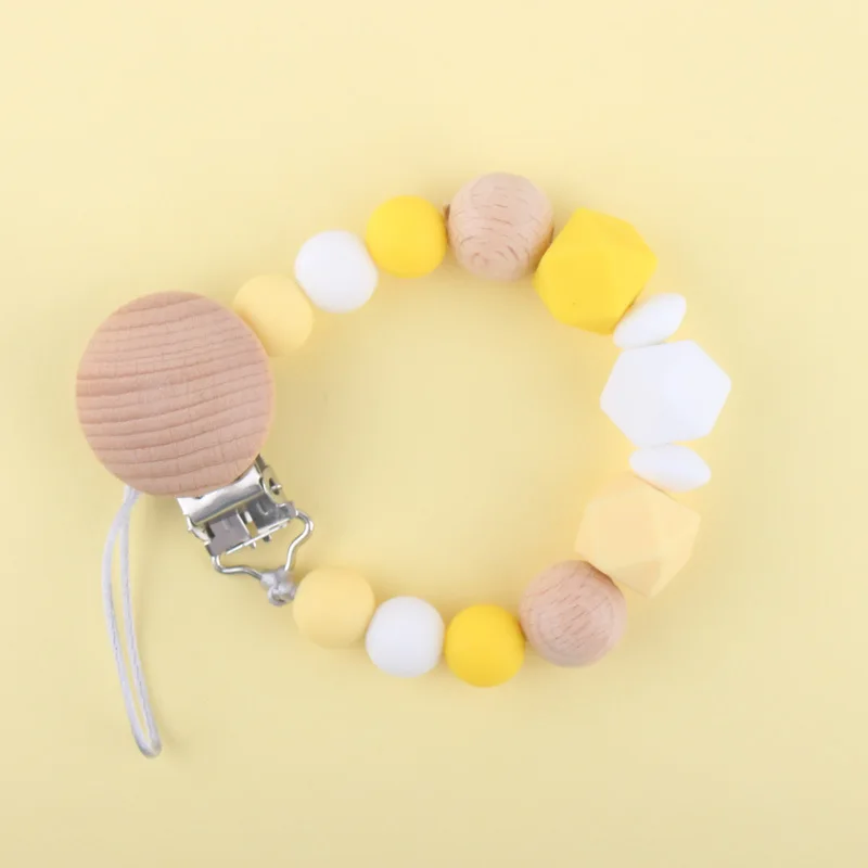 DIY Colorful Wooden Baby Pacifier Clips Funny Pacifier Chain For Infant Feeding Toddler Teething Chew Toy Dummy Clips BPA Free
DIY Colorful Wooden Baby Pacifier Clips Funny Pacifier Chain For Infant Feeding Toddler Teething Chew Toy Dummy Clips BPA Free