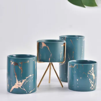 Nordic home office golden marble pattern flower pot iron ceramic pot cosmetic pen container vase decoration WY706
Nordic home office golden marble pattern flower pot iron ceramic pot cosmetic pen container vase decoration WY706