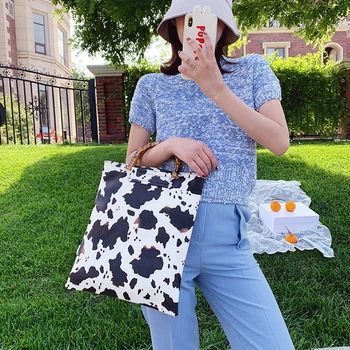 Vintage Women Cow Milk Handbag Bamboo Handle Big Capacity Tote Shopping Bag PU Leather Large Capacity Female Portable Daily Bag
Vintage Women Cow Milk Handbag Bamboo Handle Big Capacity Tote Shopping Bag PU Leather Large Capacity Female Portable Daily Bag