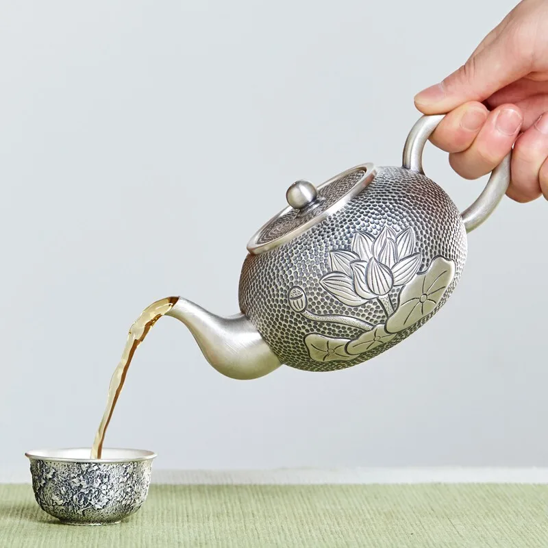 Silver pot sterling silver S999 teapot tea ceremony anti-scalding heat insulation Kung Fu tea set household 350ml 319g
Silver pot sterling silver S999 teapot tea ceremony anti-scalding heat insulation Kung Fu tea set household 350ml 319g